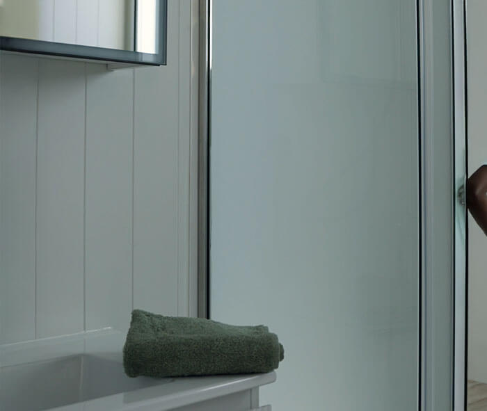 Frameless glass shower with Hansa sliding door