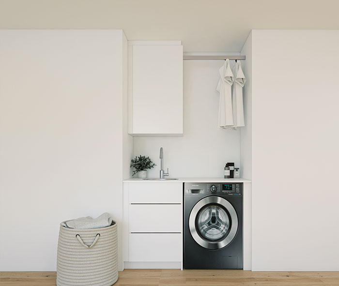 Built-in European-style laundry with engineered stone benchtop